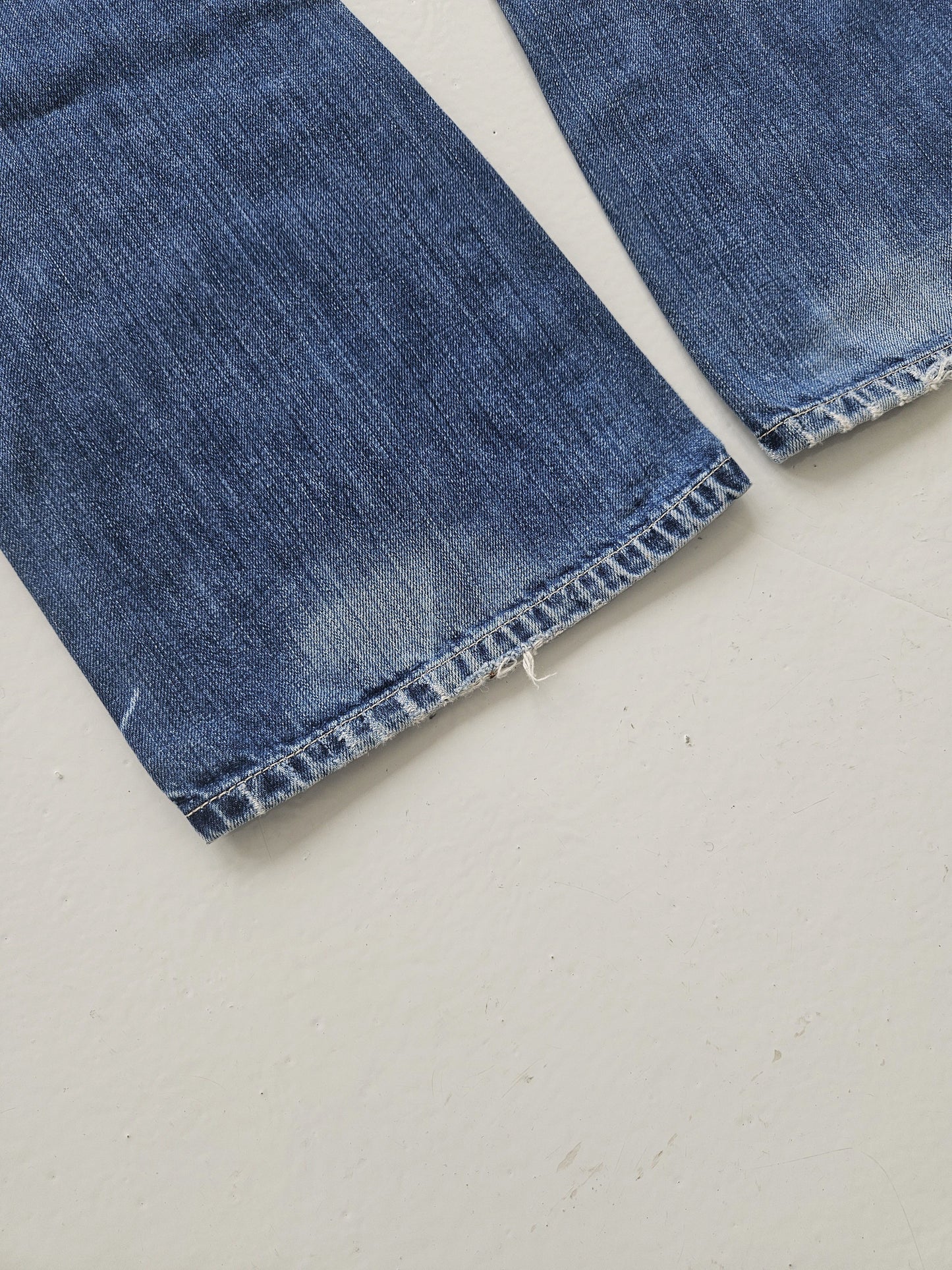 Vintage distressed bootcut low waisted denim