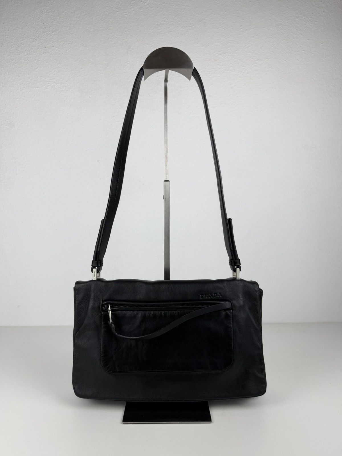Vintage Prada embossed logo leather shoulder bag