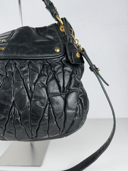 Miu Miu matelasse pleated leather coffer bag in deep green
