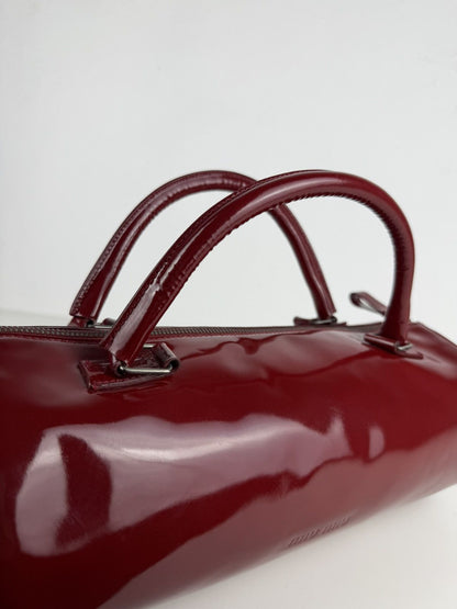 Vintage 90s Miu Miu patent leather cylindrical handbag