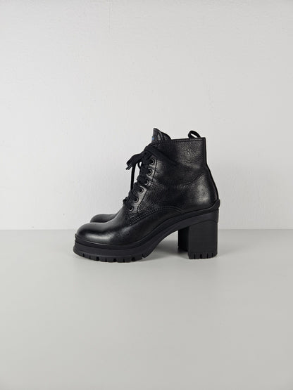 Prada lace up block heel notched sole ankle boots