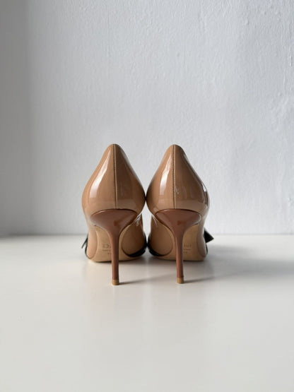 Dior patent leather buckled pointed toe pumps with bow