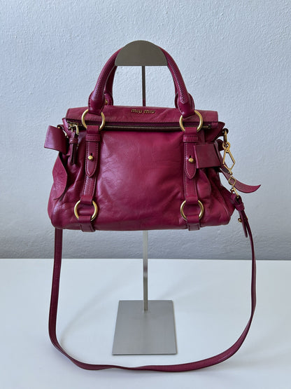 Vintage y2k miu miu vitello bow bag in pink