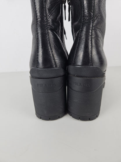 Prada lace up block heel notched sole ankle boots