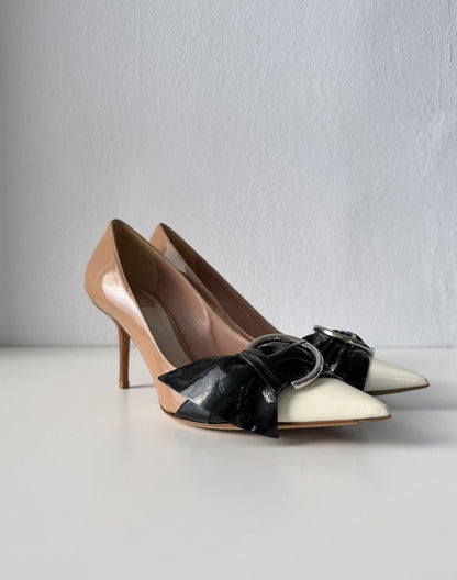 Dior patent leather buckled pointed toe pumps with bow