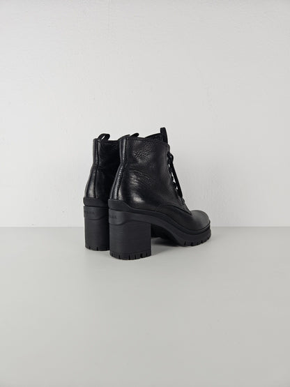 Prada lace up block heel notched sole ankle boots