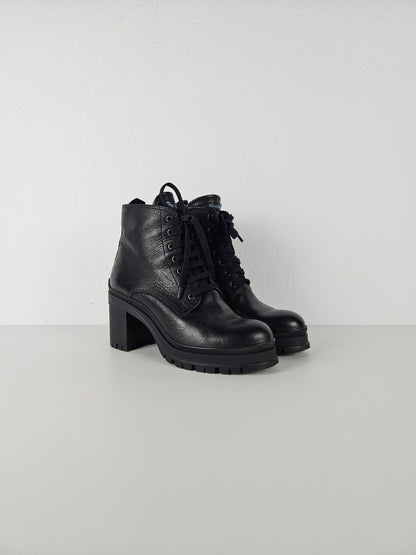 Prada lace up block heel notched sole ankle boots
