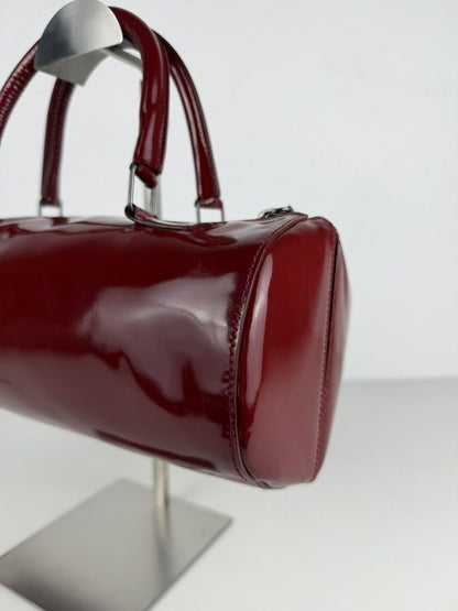 Vintage 90s Miu Miu patent leather cylindrical handbag