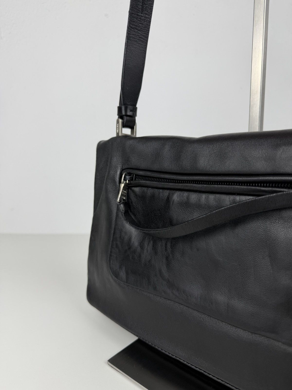 Vintage Prada embossed logo leather shoulder bag