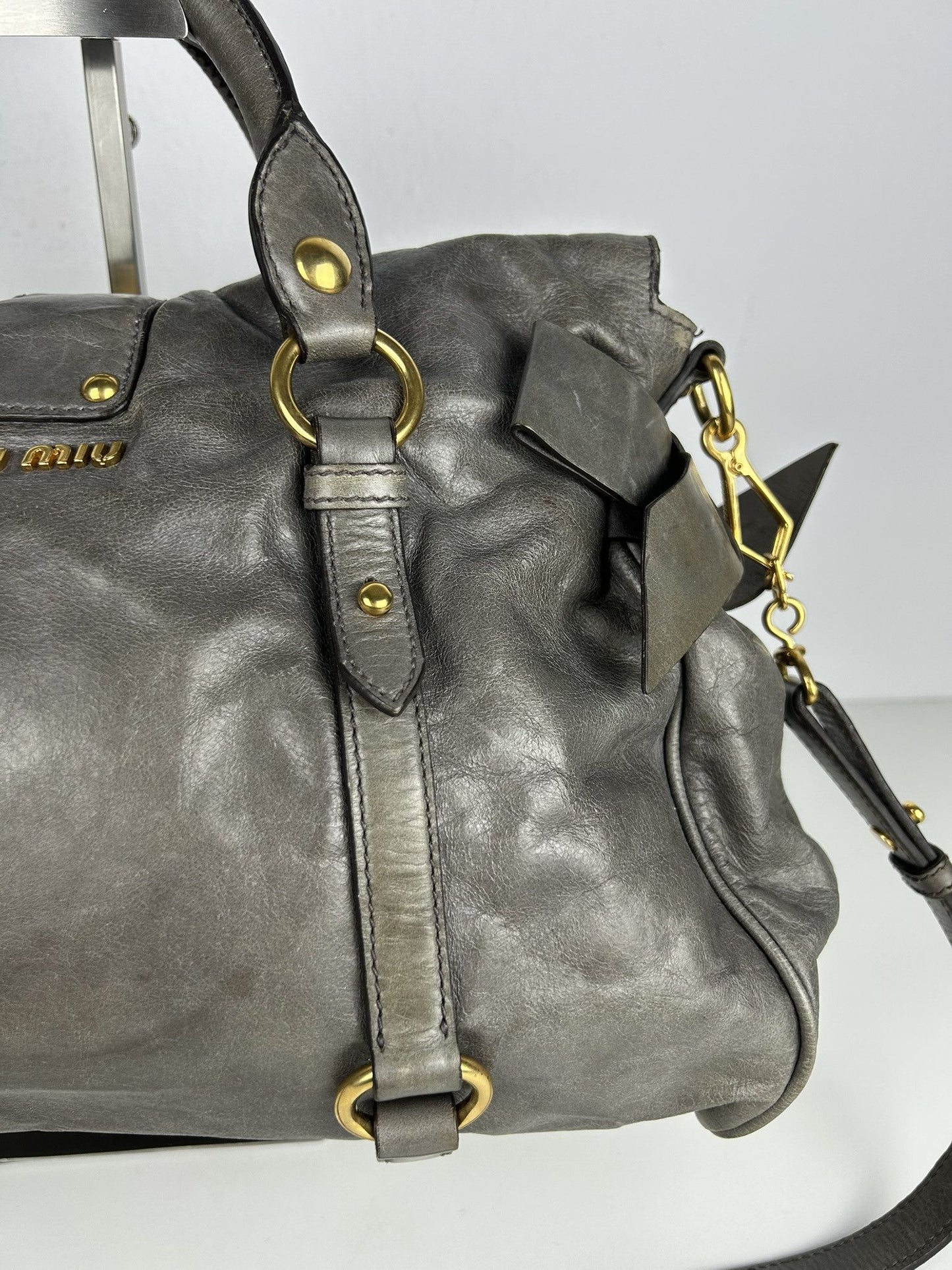 Miu miu vitello bow bag in gray with locket