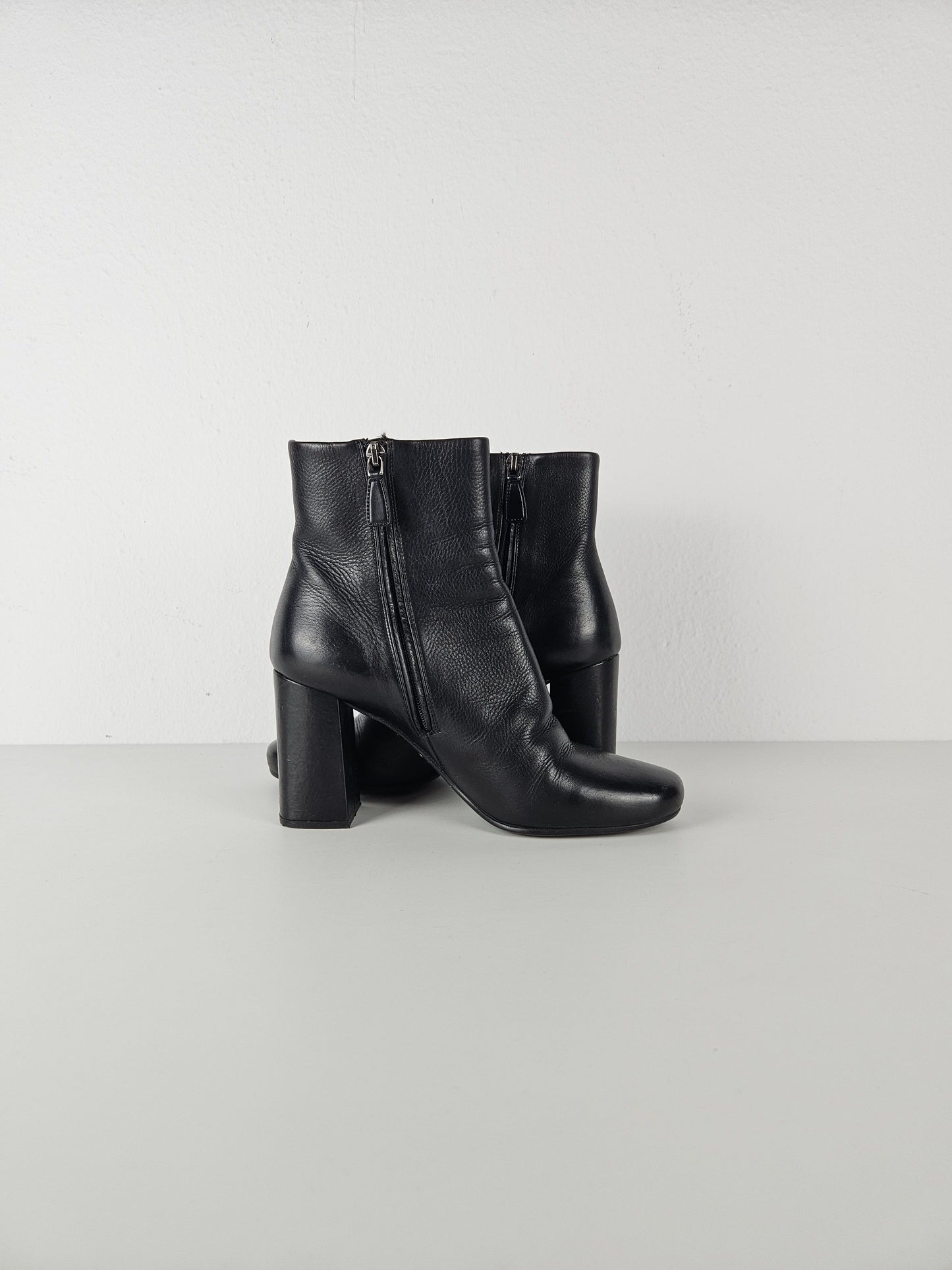 Prada calf leather side zip block heel ankle boots