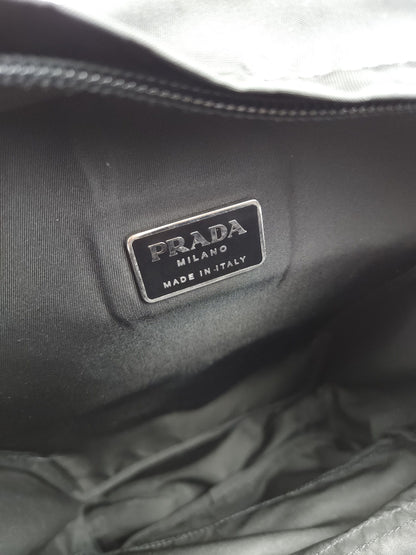 Prada triangle logo nylon multipocket backpack