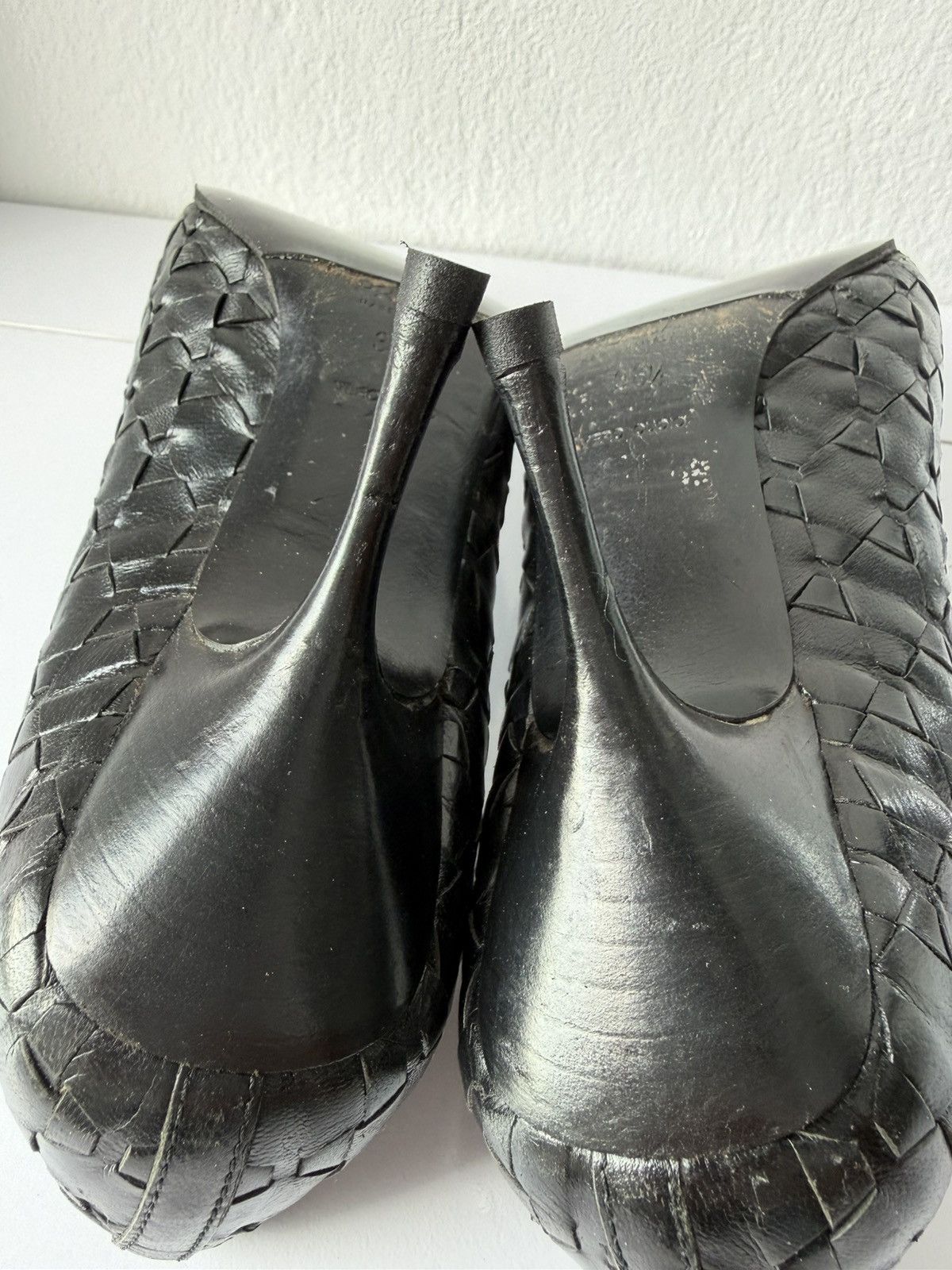 Prada woven leather long toe pumps with bow