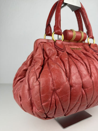 Miu Miu matelasse pleated leather handbag