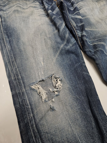 Edwin blue trip distressed washed bootcut denim
